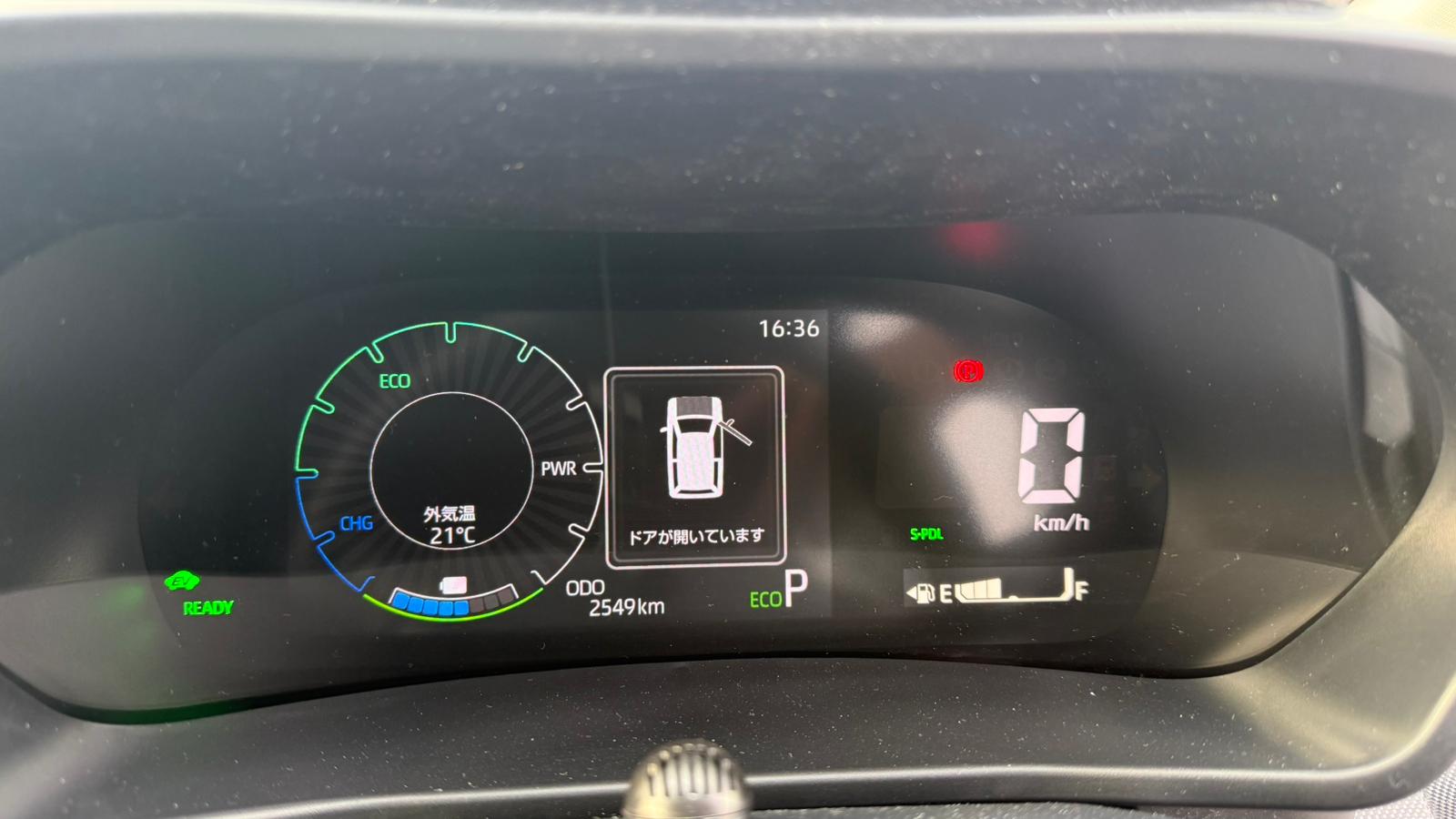 Toyota Raize hybrid fuel efficiency 22 km per liter dashboard display